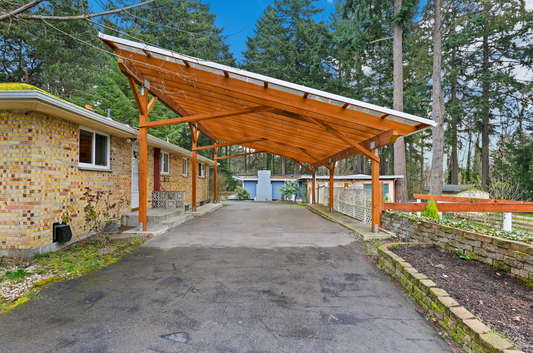Carport and storage with gravel ezyhex driveway